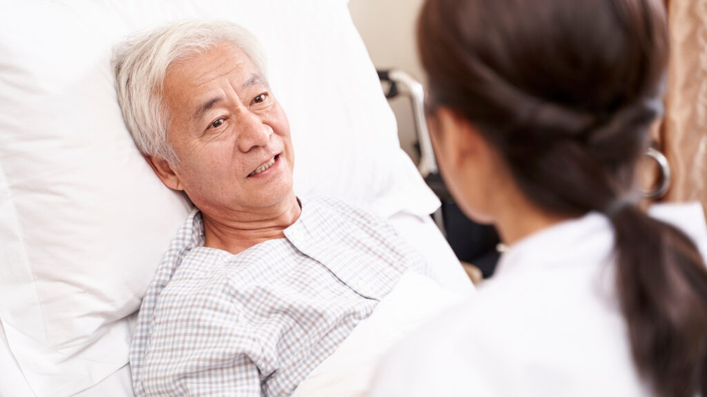 A patient talking to a doctor.