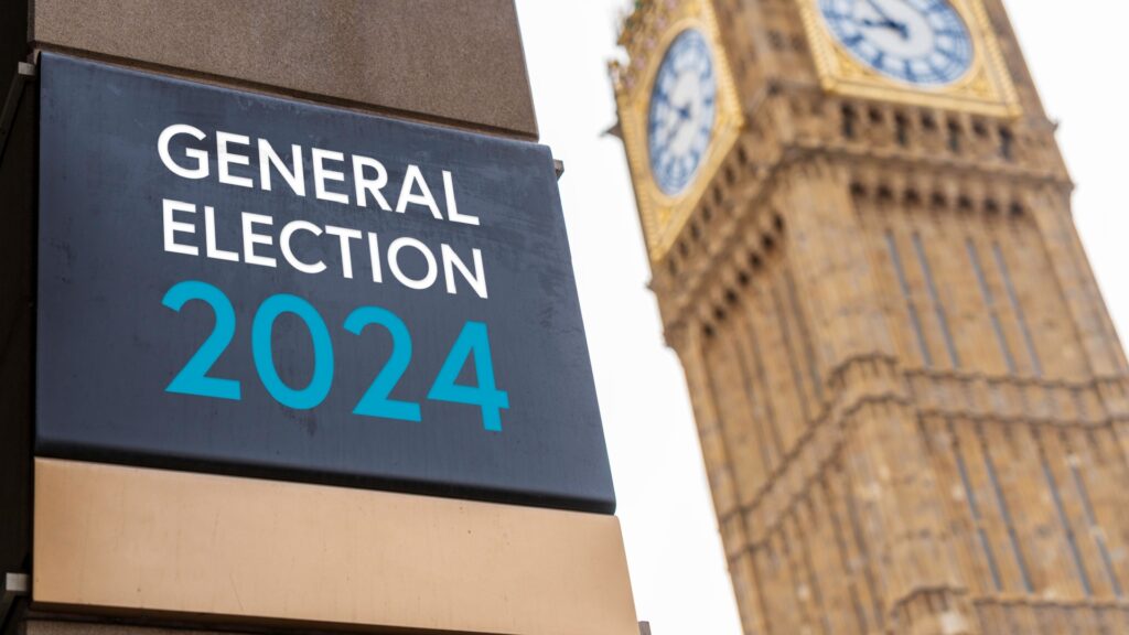 general election sign in front of the Palace of Westminster