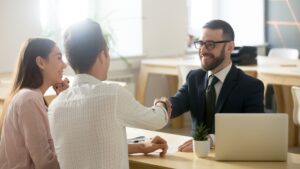 A couple meeting with a financial planner.